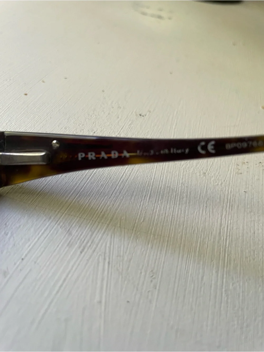 Prada Havana tortoiseshell glasses VPR 14H